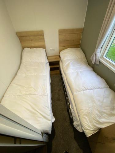 Postel nebo postele na pokoji v ubytování Marsden Escape