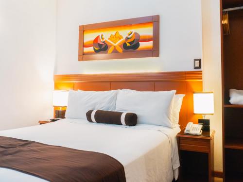 Postel nebo postele na pokoji v ubytování Hotel Ferré Machu Picchu