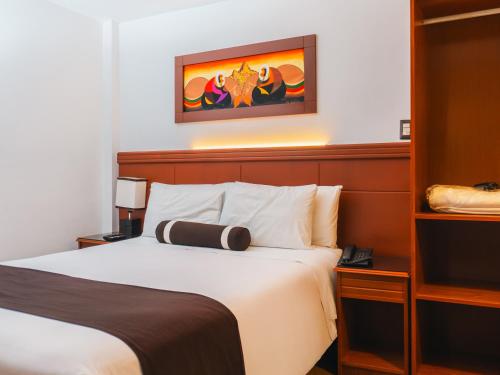 Postel nebo postele na pokoji v ubytování Hotel Ferré Machu Picchu