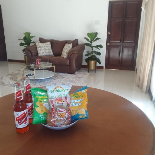a bowl of chips and snacks on a table at Gorgeous 1 Bedroom Apartment in the Kingston Hills in Kingston