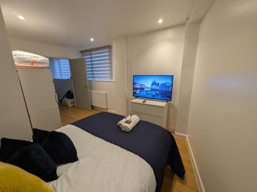 Postel nebo postele na pokoji v ubytování FreeParking LUTON M1 Flat sleep3