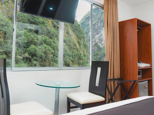 TV a/nebo společenská místnost v ubytování Hotel Ferré Machu Picchu