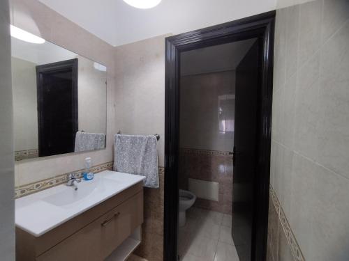 Koupelna v ubytování rabatcitycenterresidence