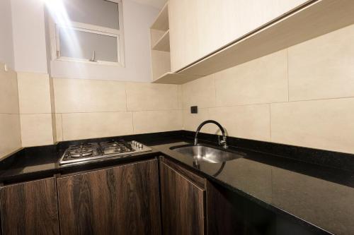 Kuchyň nebo kuchyňský kout v ubytování HOTEL HTL
