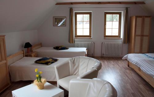 Posteľ alebo postele v izbe v ubytovaní Apartments Odměny U Třeboně