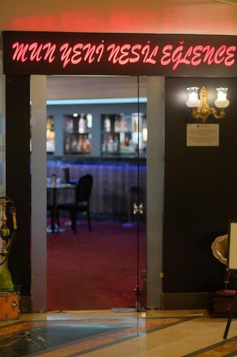 a restaurant with a sign that reads main twenty west extremes at The Green Park Bostancı in Istanbul