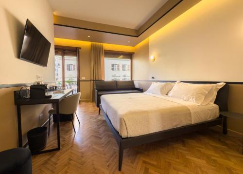 Postel nebo postele na pokoji v ubytování Vatican Domus Stefania Guest House