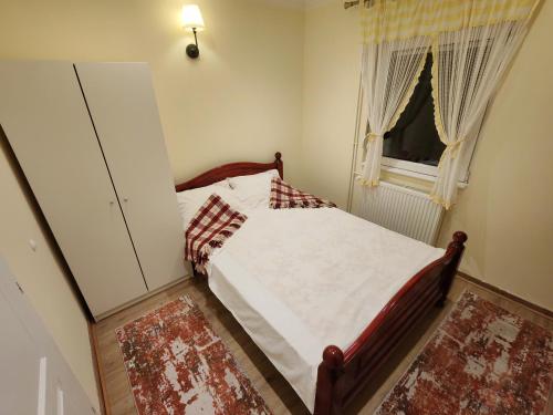 Postel nebo postele na pokoji v ubytování Ravana Sky Apartments