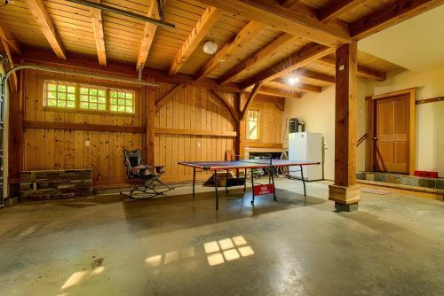 a large room with a table in a barn at M-Hill Lodge Stevenson 98 in Stevenson