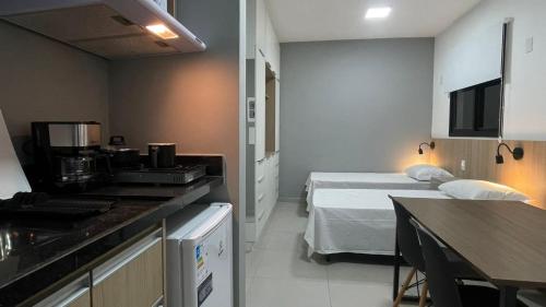 Η κουζίνα ή μικρή κουζίνα στο Apartamento Completo com Piscina, Academia e Salão de festas em São Carlos