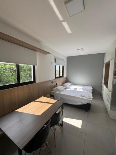 Ένα ή περισσότερα κρεβάτια σε δωμάτιο στο Apartamento Completo com Piscina, Academia e Salão de festas em São Carlos