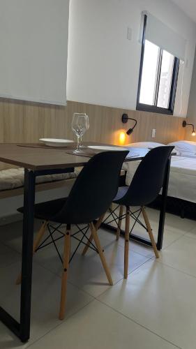 Ένα ή περισσότερα κρεβάτια σε δωμάτιο στο Apartamento Completo com Piscina, Academia e Salão de festas em São Carlos