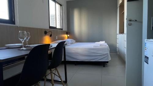 Ένα ή περισσότερα κρεβάτια σε δωμάτιο στο Apartamento Completo com Piscina, Academia e Salão de festas em São Carlos