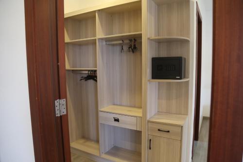 TV a/nebo společenská místnost v ubytování Yue Lai Hotel