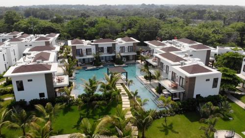 an aerial view of a resort with a swimming pool at Luxury Villas en Monterrico in Monterrico
