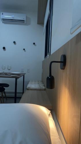 Ένα ή περισσότερα κρεβάτια σε δωμάτιο στο Apartamento Completo com Piscina, Academia e Salão de festas em São Carlos