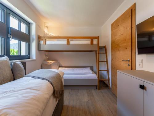 Postel nebo postele na pokoji v ubytování Wagrainer TauernLodge 42B