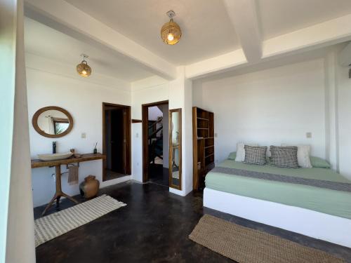 Cama o camas de una habitación en Hotel Sanmara