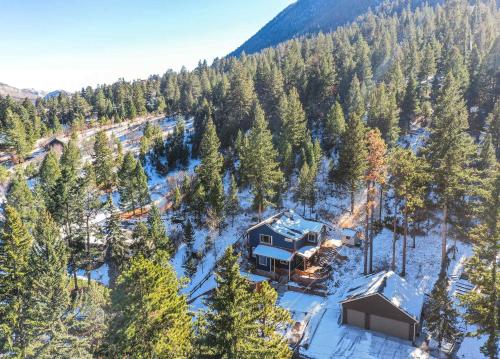 an aerial view of a house in the woods at Cobalt Peak - Pet-Friendly Sauna Panoramic Views in Cascade-Chipita Park