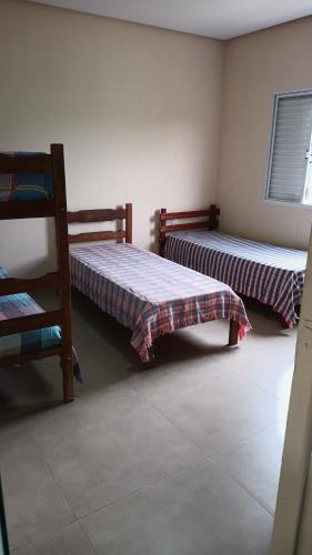 Casa com piscina Piumhi Capitolioにあるベッド