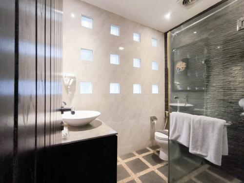 Koupelna v ubytování Puteri Gunung Hotel