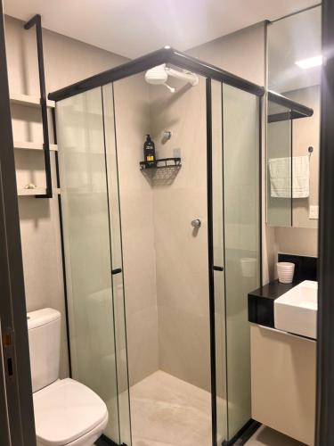 Ένα μπάνιο στο Brezze Residence pé na areia