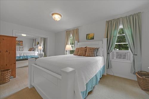 Ένα ή περισσότερα κρεβάτια σε δωμάτιο στο Muhlenberg Cottage