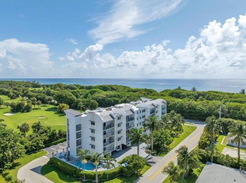 an aerial view of a resort with the ocean in the background at Luxury - 2BR 2BA - Balcony - Right Across From the Beach in Boca Raton