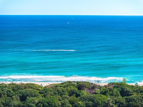 an aerial view of a beach and the ocean at Luxury - 2BR 2BA - Balcony - Right Across From the Beach in Boca Raton