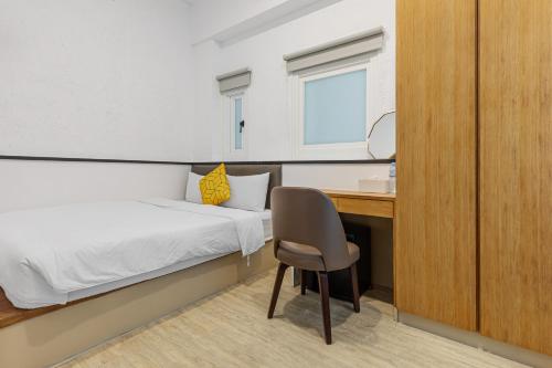 Postel nebo postele na pokoji v ubytování 35.5 Inn