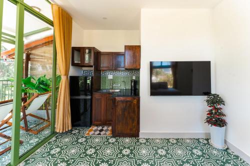 Кухня или мини-кухня в Pine Beach apartment
