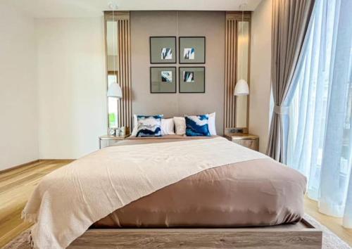 Ένα ή περισσότερα κρεβάτια σε δωμάτιο στο Choengtale Modern Villa