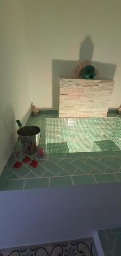 a bathroom with a counter top with a pot on it at La Morería y su jacuzzi in La Puebla de los Infantes