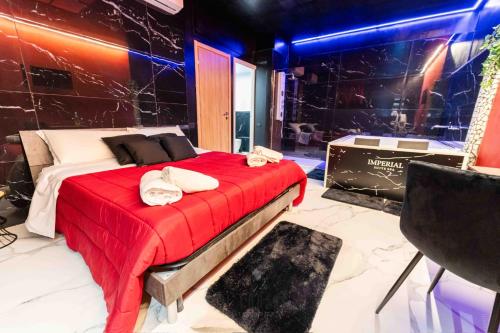 Postel nebo postele na pokoji v ubytování Il corso suite rooms