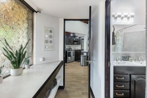 a kitchen with a sink and a counter top at Villa Sunrise - Incredible Ocean Views! in Ocotal