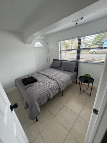 Cama o camas de una habitación en Pacifica Fort Lauderdale Airport