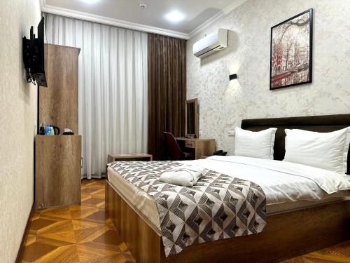 Letto o letti in una camera di Hotel 1946