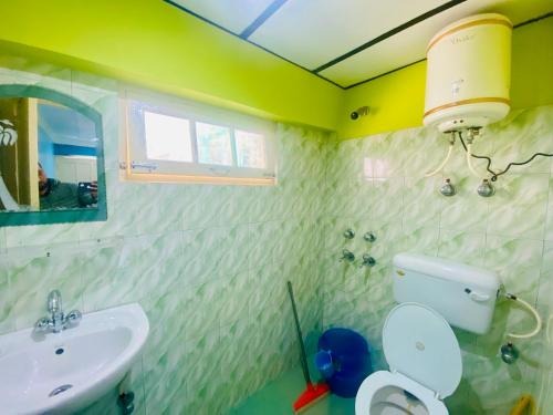 Un baño de Jagatram Niwas Guesthouse Dharamkot