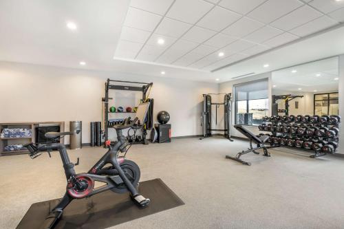 a gym with treadmills and exercise equipment in a building at Home2 Suites By Hilton Reynoldsburg Columbus East in Columbus
