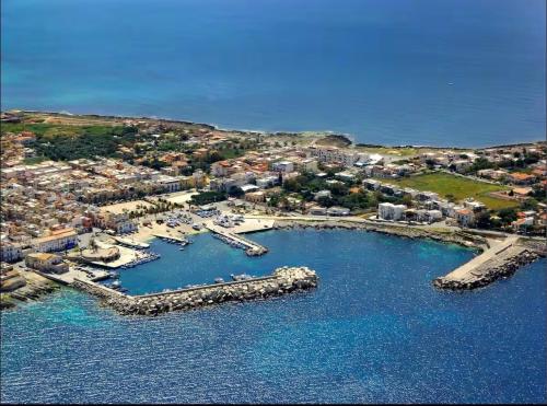 an aerial view of a harbor with boats in the water at Chalet Seaview by AR Group Hotels in Isola delle Femmine