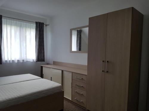 En eller flere senge i et værelse på Villa Natali Podhájska