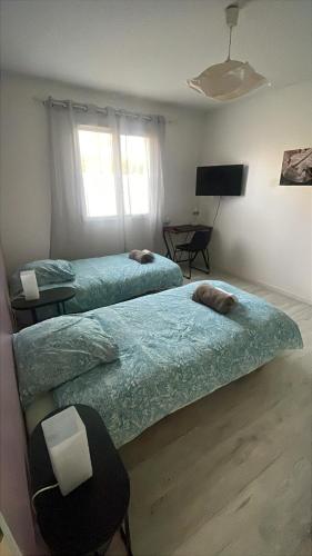 Postel nebo postele na pokoji v ubytování Ophidia
