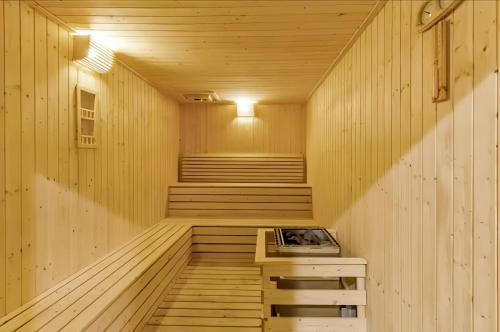 a sauna with wooden floors and stairs in a building at The Robertson Bukit Bintang in Kuala Lumpur