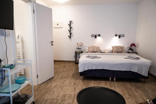 a bedroom with a bed in a room at Varalja Apartments in Plavecké Podhradie