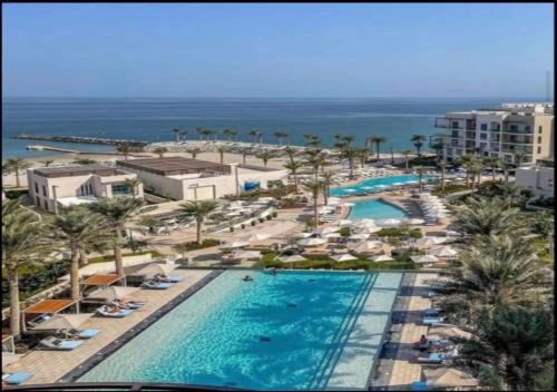 a view of the pool at the resort at Bespoke Holiday Homes - Seaside Luxury 2BR in Address Residence, Fujairah in Fujairah