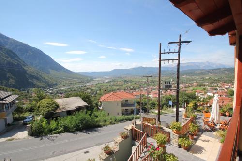 a view of a city from a balcony of a town at Grand Hotel Dentro in Konitsa