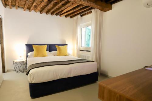 Posteľ alebo postele v izbe v ubytovaní Palazzina B - Contemporary Studio