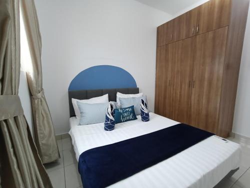 Una cama o camas en una habitación de Alanis Suites Byfeha