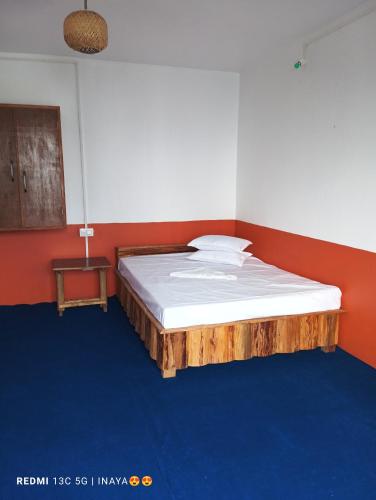 Postel nebo postele na pokoji v ubytování Gurung Homestay