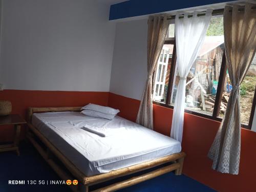 Postel nebo postele na pokoji v ubytování Gurung Homestay